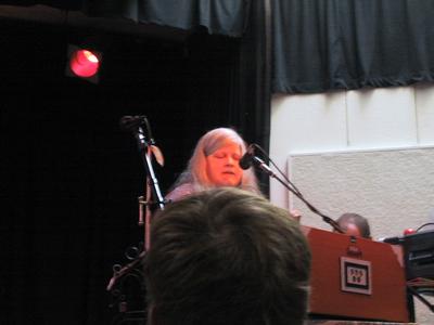 Neile reading amongst the chaos