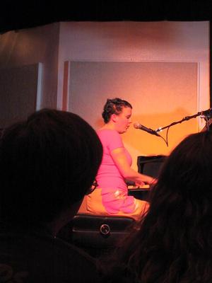 she scribbles notes while driving