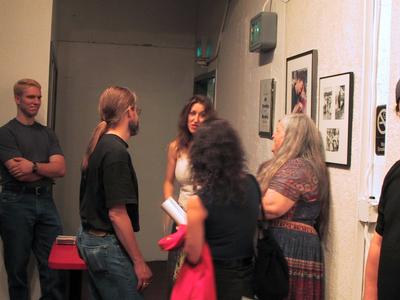Jim, Tamar, and Neile chatting with Happy
