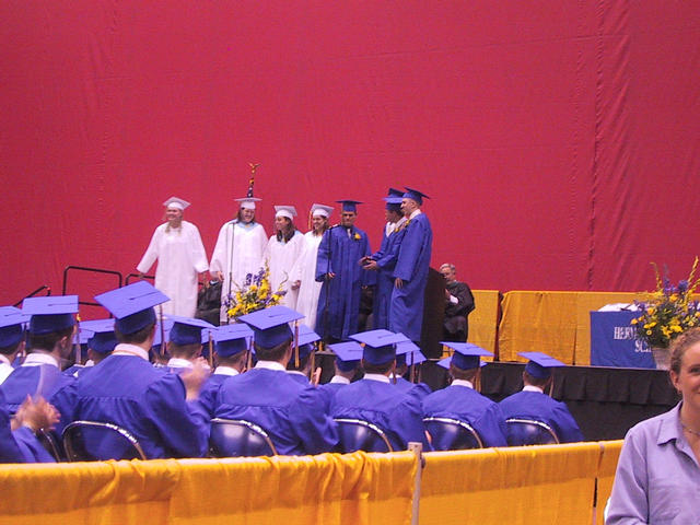 The Chorus acknowledges the crazed applause from the crowd