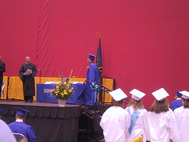 Brett hits the stage to get his diploma
