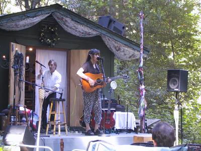 Michelle plays while Phil scurries around in the background