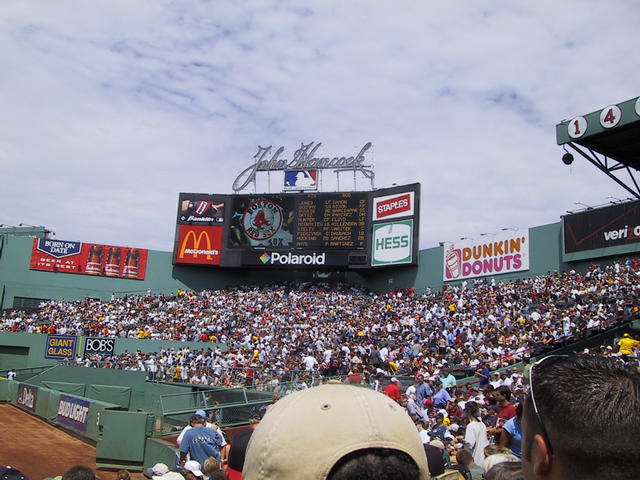 The electric scoreboard and the bleachers