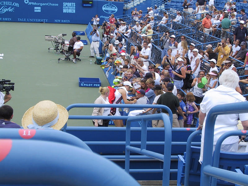 Davenport signs autographs on her way out