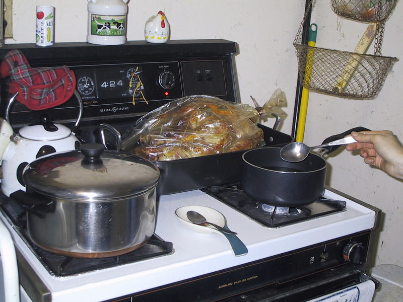 The turkey's done!  Potatoes in the pot, apple wine mulling
